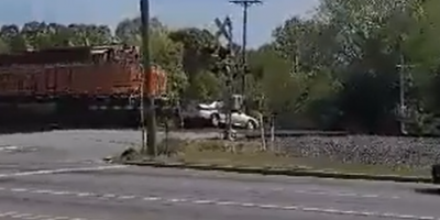 Female N Carolina Driver  Narrowly Escapes Before Train Slams Into Her Car