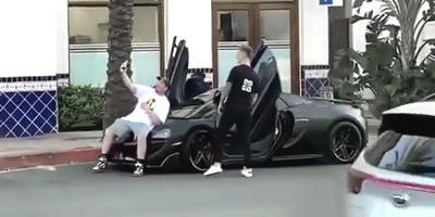 McLaren Owner Lays Into Drunk Jackass Touching His Car