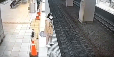 Accident? Girl Falls Under Oncoming Passenger Train