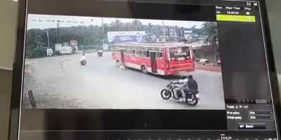 Short: Woman Falls Out Of The Moving Bus In India