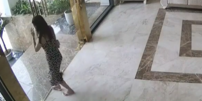 Woman Hits The Glass Door In Vietnam
