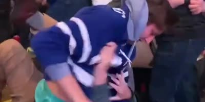 Toronto : Fight Breaks Out In Stands After Grown Man Put his Hand On a Woman