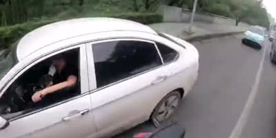 Chinese Biker Films Himself Punching Crying Driver