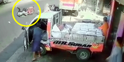 Female Rider Falls Under Truck Wheels In Indonesia