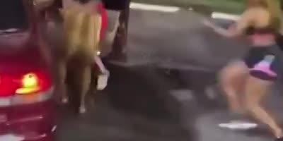 Girls Fighting Outside A Gas Station.