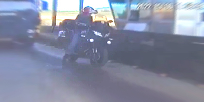 Truck Slams Through Biker Stopped at Toll Booth
