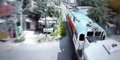 Indonesian Biker Obliterated By Train