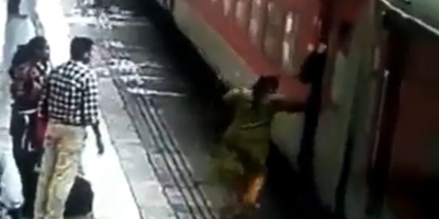 Woman Slips Under The Train In India