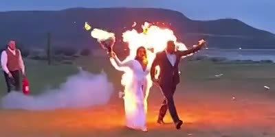 Newlyweds Set Themselves On Fire During Wild Scene At Wedding.