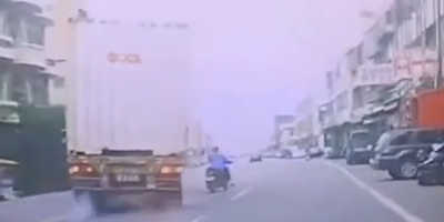Biker Barely Avoids Getting Squashed By Truck In Taiwan