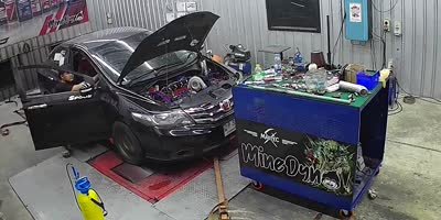 Car Gets Checked For Speed At A Repair Garage.