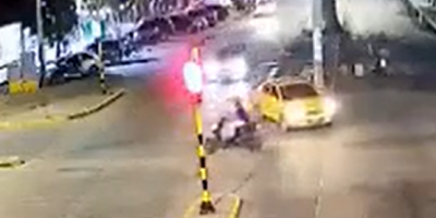 Scooter Rider Wrecked At The Intersection In Colombia