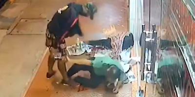 Man in Thailand repeatedly kicks homeless man in the face