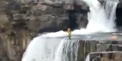 Woman Falls Off The Waterfall In Front Of Tourists