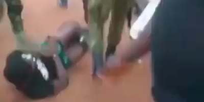 Nigerian Police Throw Suspect Like A Bag Of Shit