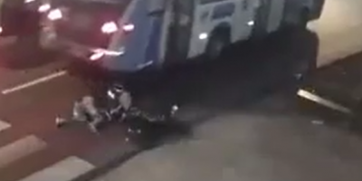 Pillion Rider Falls Under The Bus Wheels