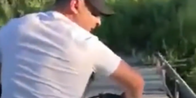 Dude Riding ATV Falls From Bridge.