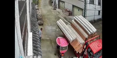 Rider Crushed By Falling Load In China
