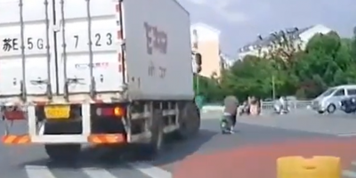 Scooter Rider Ran Over By Truck In China