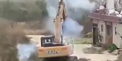 Man Defends His House From Demolition