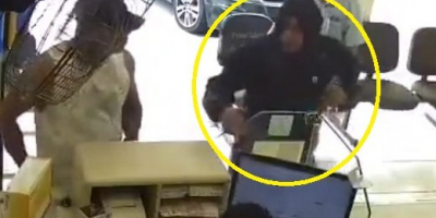 Armed thug shot in the face