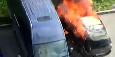 Russian Van Owner Tries To Save His Burning Vehicle & Stays Inside Forever