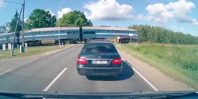 Russian Driver Catches The Train