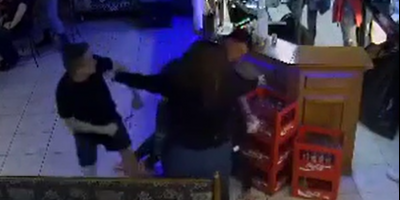 Woman Spits On Bartender Before The Fight Starts