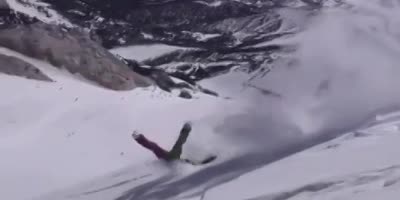 Skier cartwheels down the slope