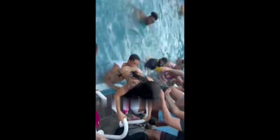 Guy caught eating out a girl's ass at a pool party - part 2