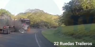 Bus crash into tanker truck.