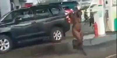 Naked Woman Freaks Out At The Gas Station In Nigeria