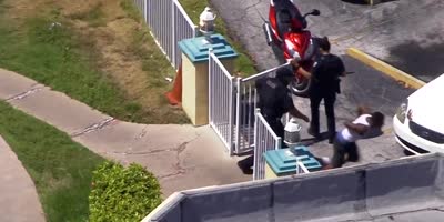 Handcuffed Suspect Makes A Break From Police During Arrest, Gravity Takes Care Him.