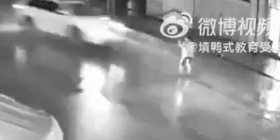 Umbrella Man Surprised By Speeding Car