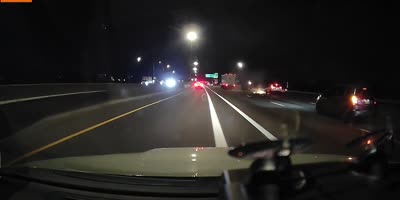 A Silver Dodge Ram Starts Shooting At Another Car Then Crashes.