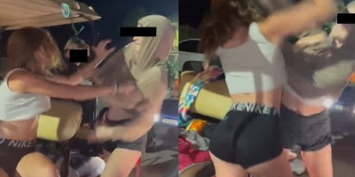 Shirt grabbing chick fight gets wild