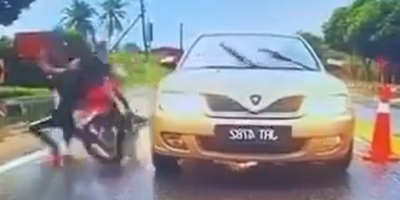 Malay Frogger Meets The Motorcycle