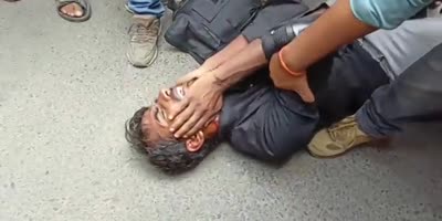 Protesting Teacher Assaulted By Authority In India