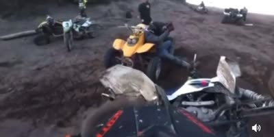 Dude Tries To Stop A Crashing ATV With His Bare Hands.