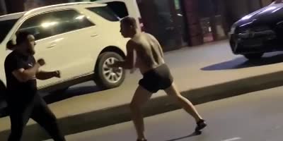 Half Naked Man Assaults Random Cars, Gets Beaten In Russia