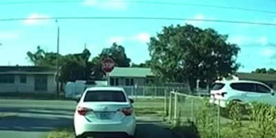 Biker flies over a car