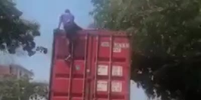 Dude Climbing On A Truck, What Could Possibly Go Wrong?(R)