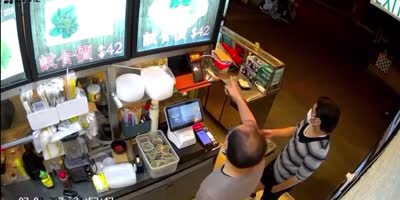 Hong Kong Eatery Owner Fools A Robber