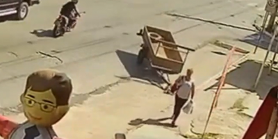 Woman hit by trailer