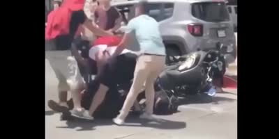 Civilian Beating A Motorcycle Cop.