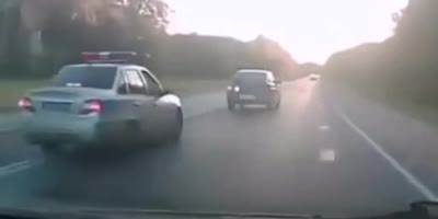 A drunk driver pushed a traffic police car