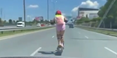 Scooter girl has a death wish
