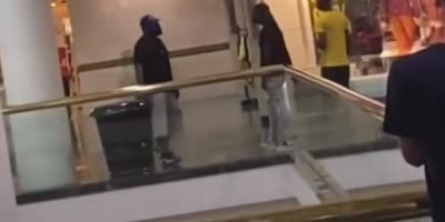 Ass kicking in a mall.