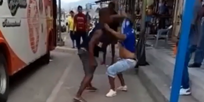 Man gets punched and hits his head