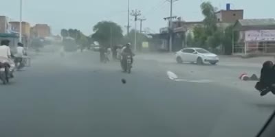 Car accident Blasts Motorcyclists Off.